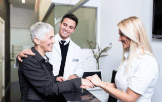 selling a dental practice. Owner shaking hands during practice sale in San Francisco